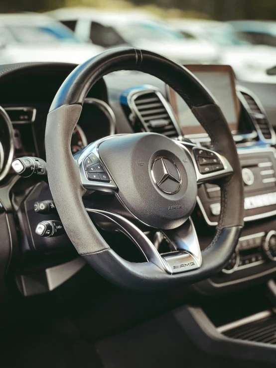 a steering wheel and dashboard of a mercedes benz benz benz