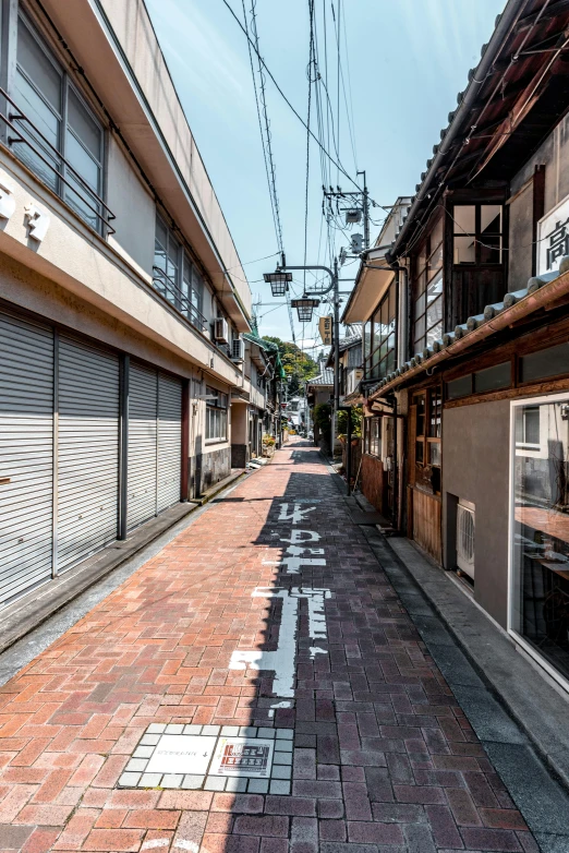 the street next to some buildings is empty