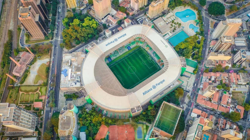 an aerial view of the tennis court in the city