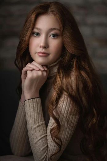 the young woman has long red hair