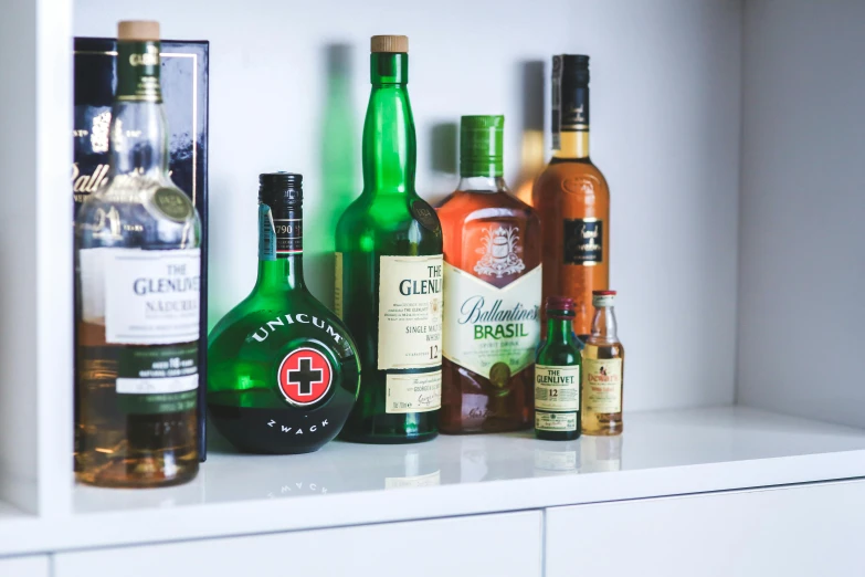 several bottles of liquor sitting on the counter