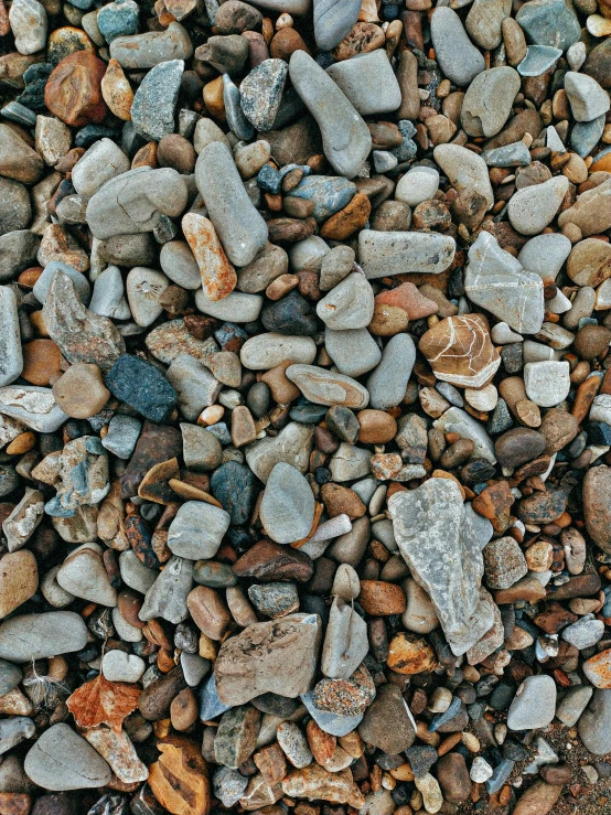 a pile of rocks and gravel in a rocky surface