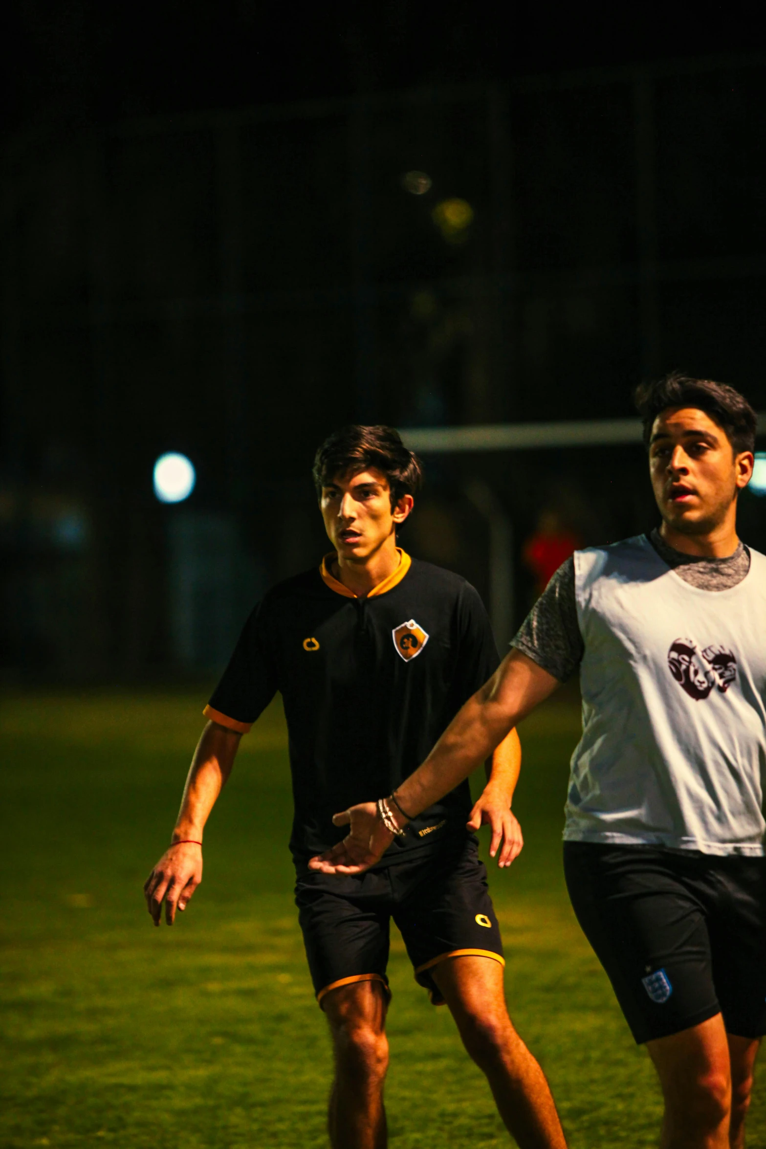 the soccer players are walking across the field together