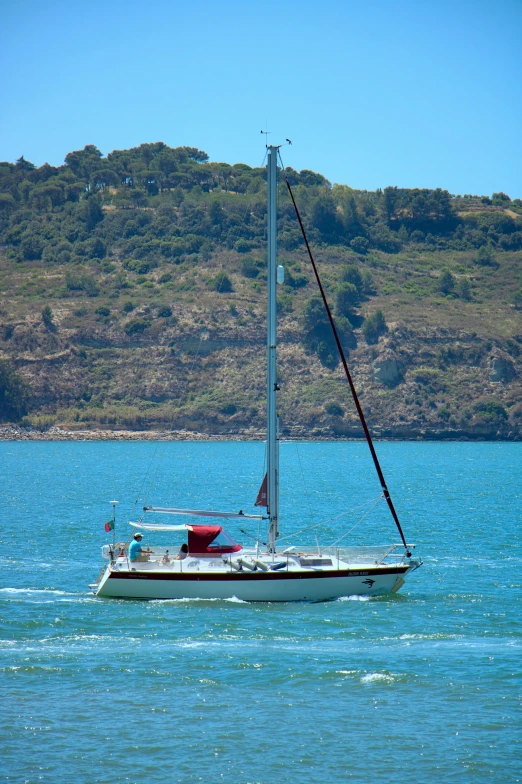 a boat sailing on a large body of water