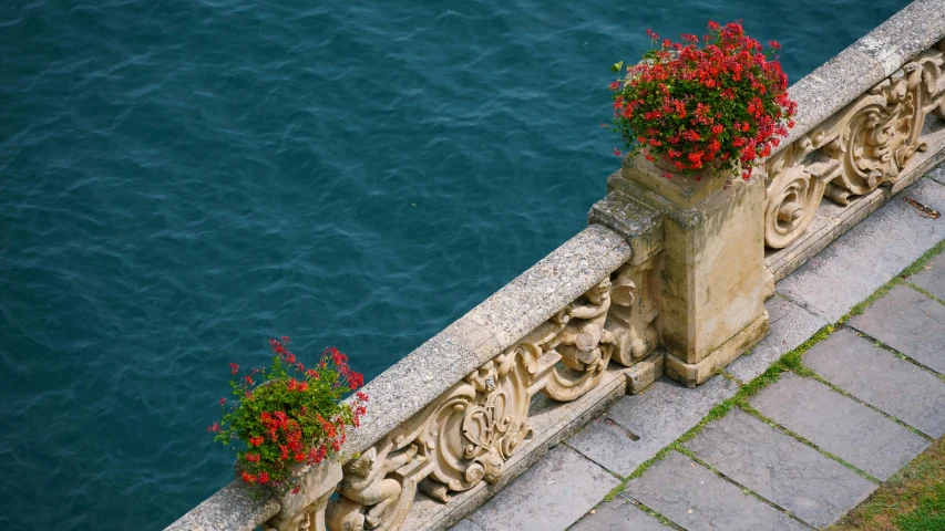 a building with a flower pot on the top and bottom