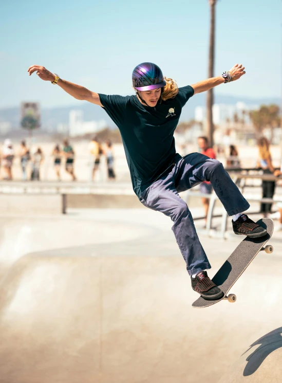 a skateboarder riding on a skateboard at a skate park