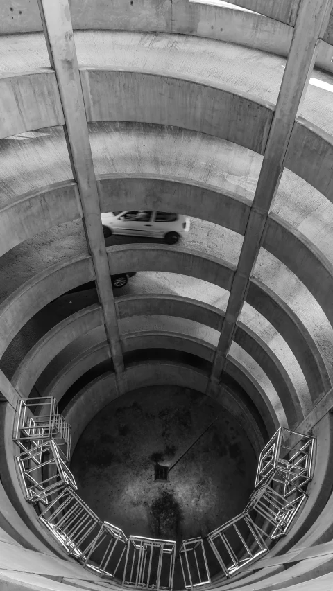 two escalators inside a tunnel, each one connected to another