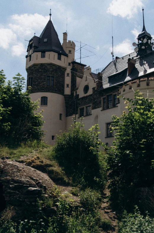 an old stone castle with turrets on top