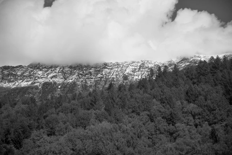 black and white pograph of snow capped mountains