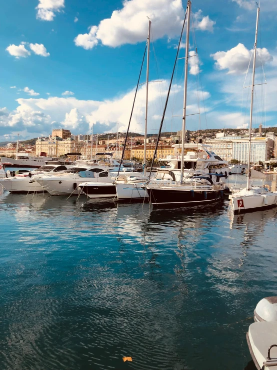 a bunch of sail boats in the water