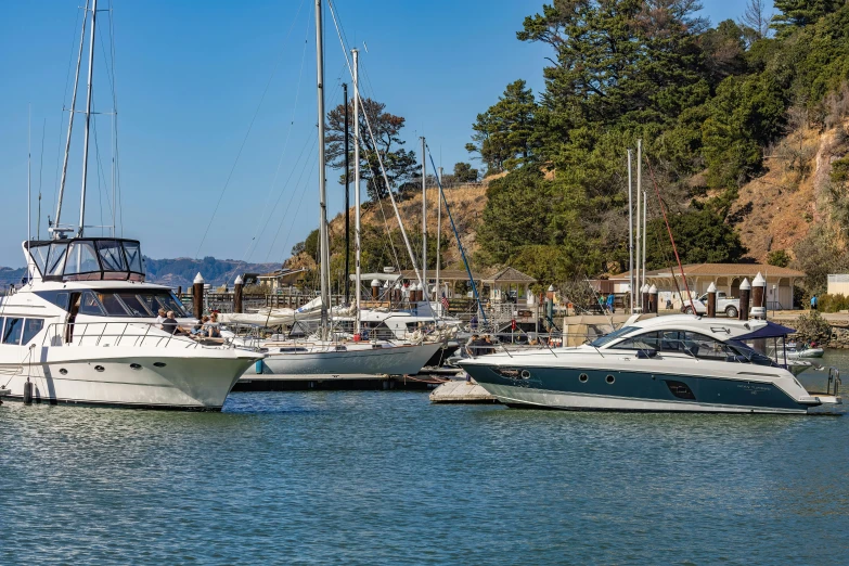 a group of boats parked next to each other at a dock