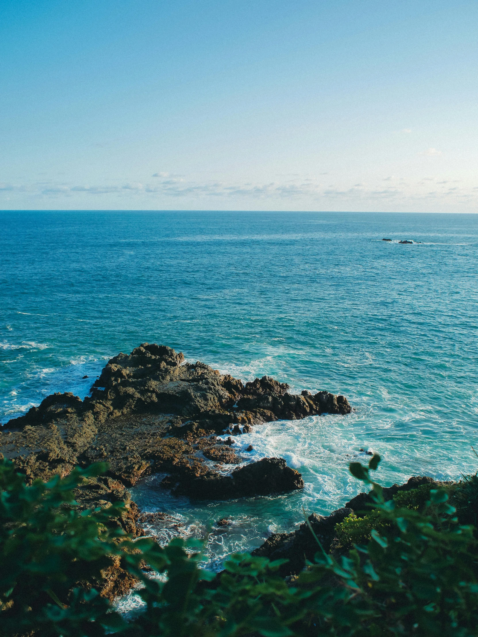 a picture of the ocean near an island