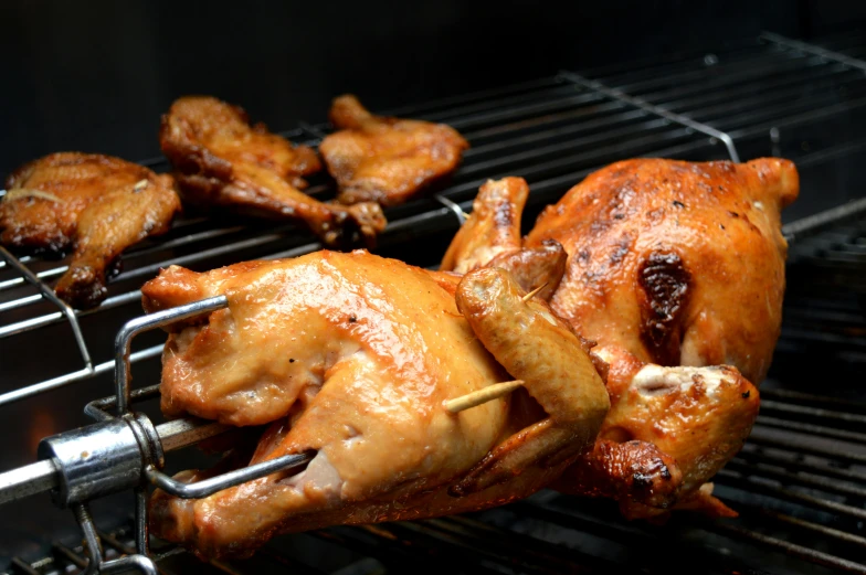 a close up of some chicken on a rack