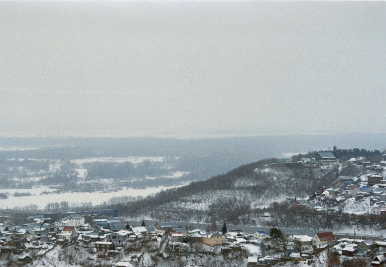 the city has a lot of buildings and snow