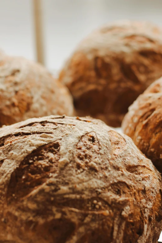 four pieces of bread on a counter ready for consumption