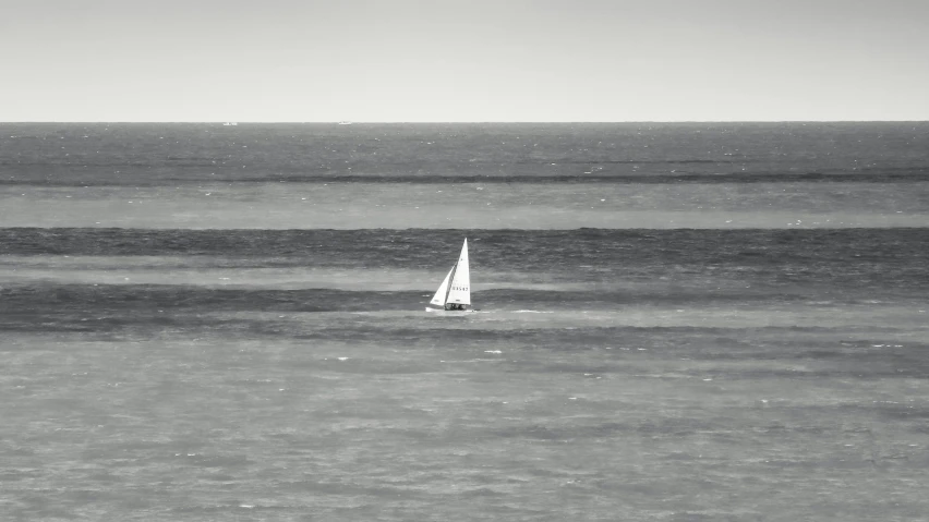 a lone boat out in the ocean