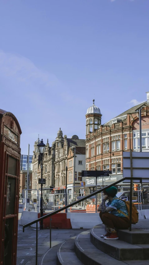 a train station and old buildings that is on the side