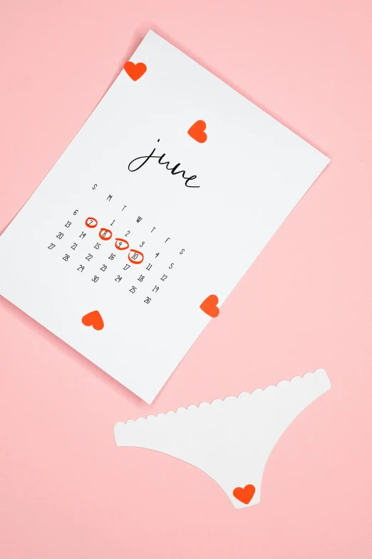 a calendar with hearts written on it