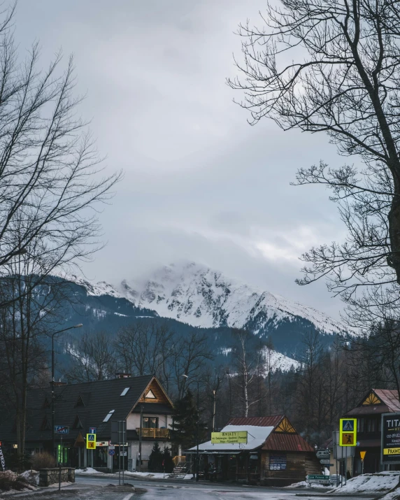 an old town is seen during the winter