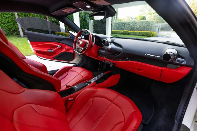 the inside of a car with leather seats and dashboard