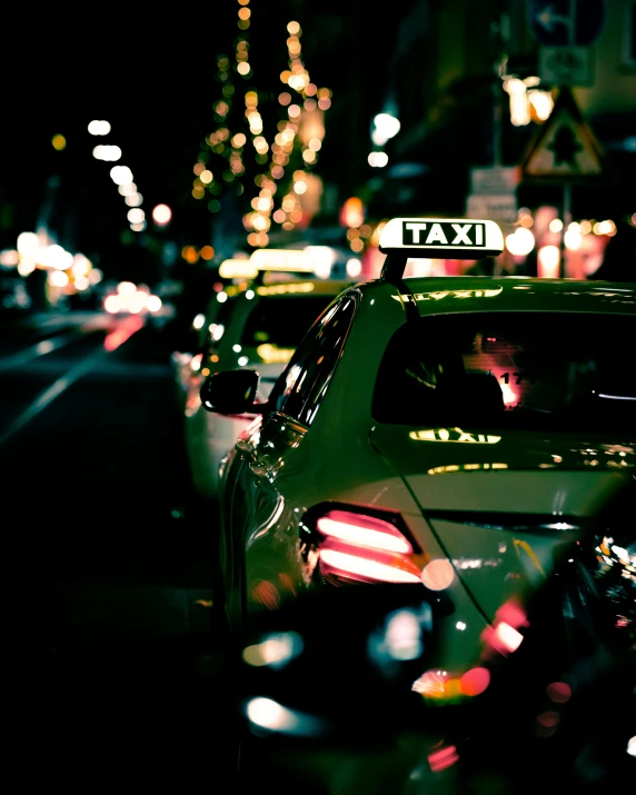 the lights are on and there is an illuminated taxi