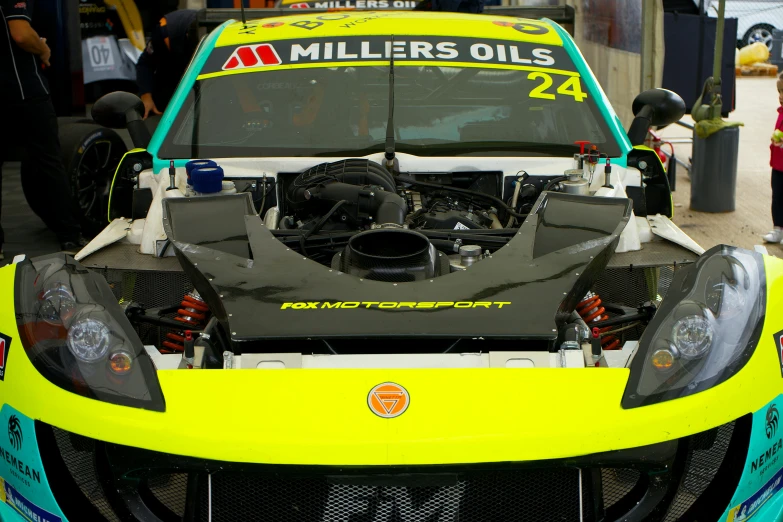 the front hood is open to show its new engine