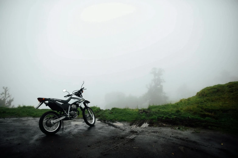 a motor bike parked on the side of the road