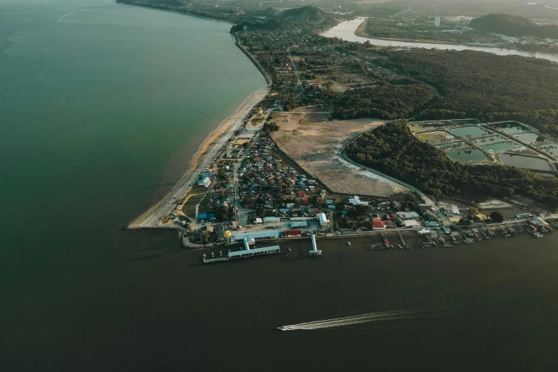 an aerial s of a beach near some water