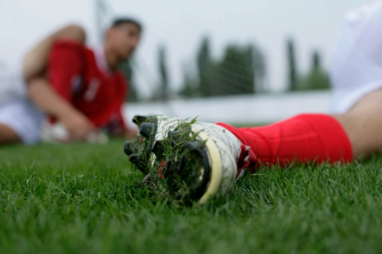 the baller and his teammates are on a soccer field