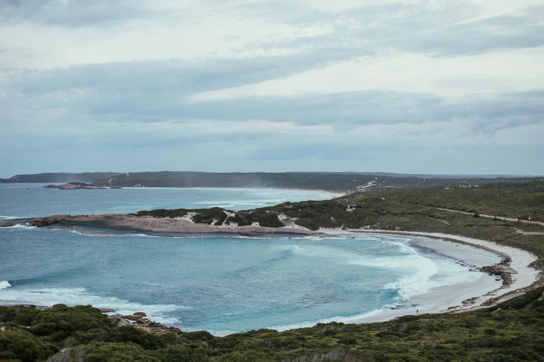 water and a sandy beach on the coast