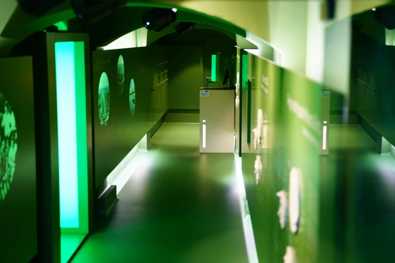 a view of a dimly lit room with only green lights