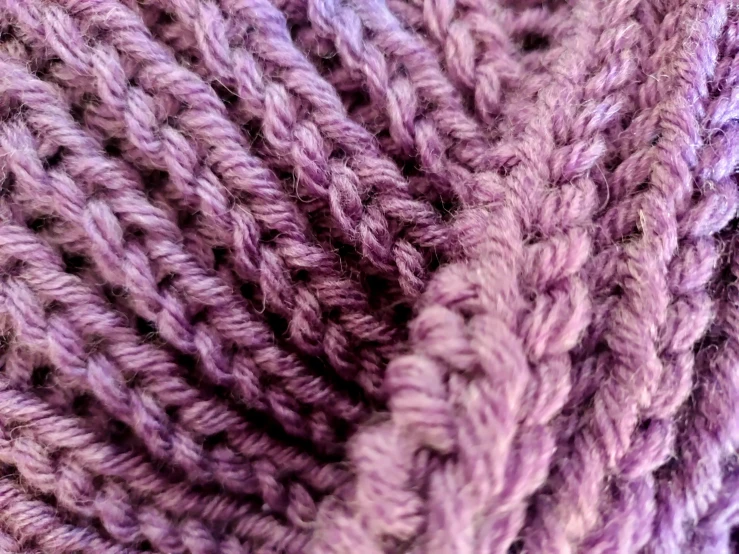 a close up view of an unweven crochet