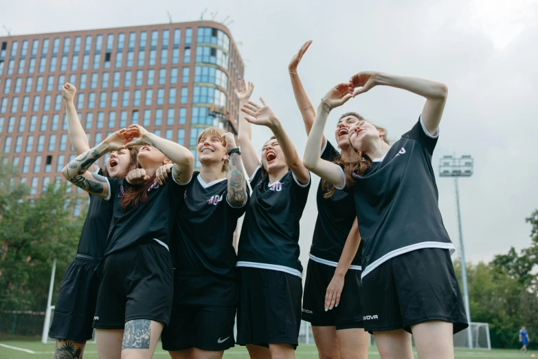 group of teenage girls celeting after a soccer game