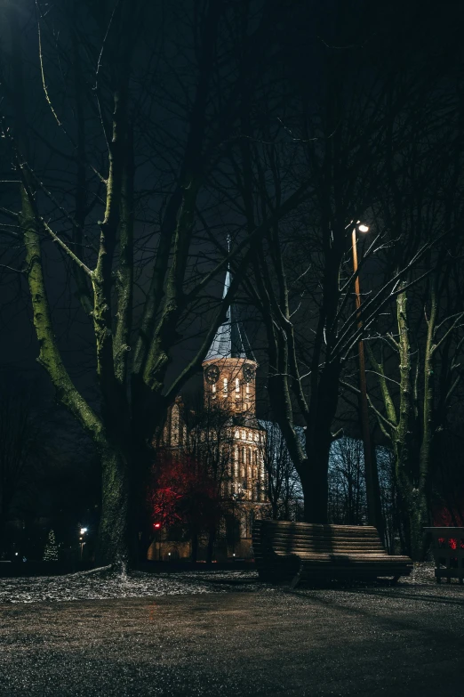 a house is lit up at night in the dark