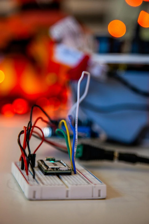 the electronic components of a tiny computer with wires