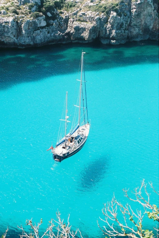 a sailboat that is sailing in the water