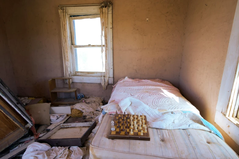 a bedroom that has been taken apart and is all dirty