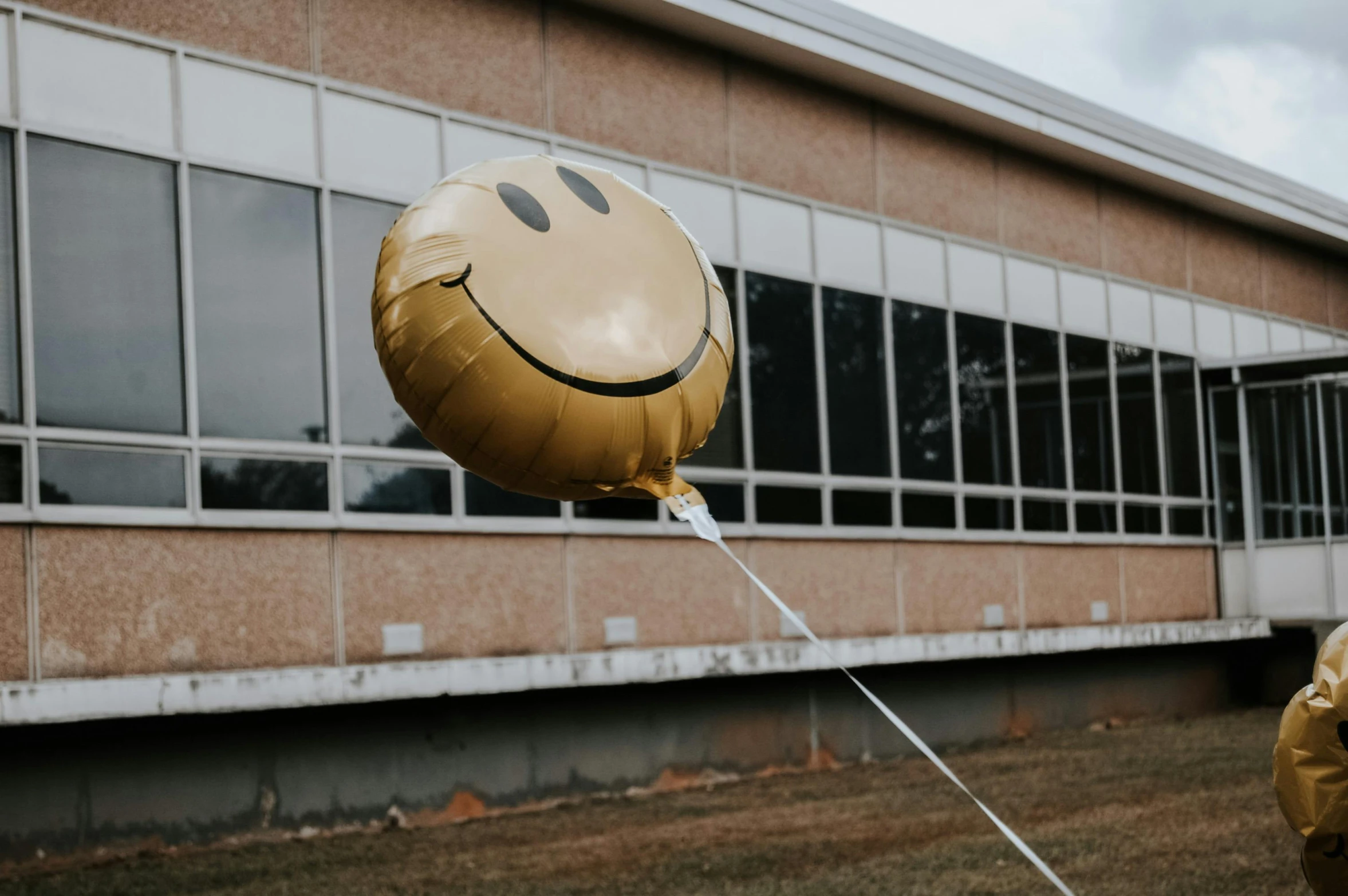 a close up of a balloon that has a smile face on it