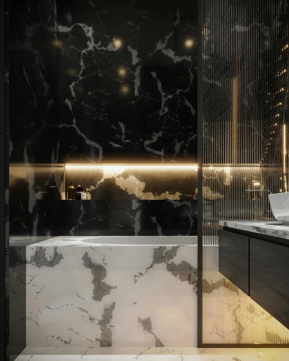a bathroom with black marble counter tops and large mirror