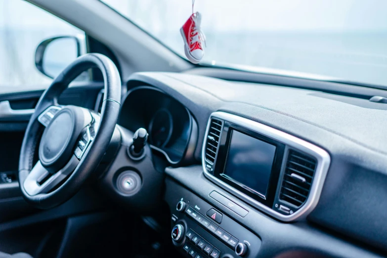 a po of a steering wheel and dashboard of a vehicle