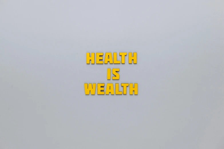 a gray and white background with the words health is well written in yellow letters