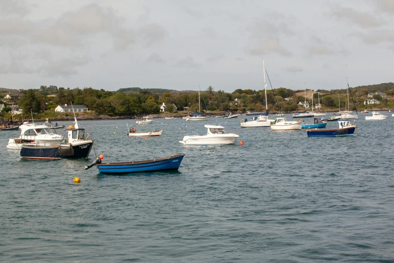 a bay filled with lots of different sized boats