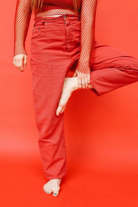 woman sitting on the floor with legs crossed