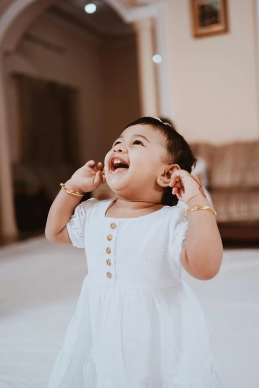 a little girl with a happy look on her face