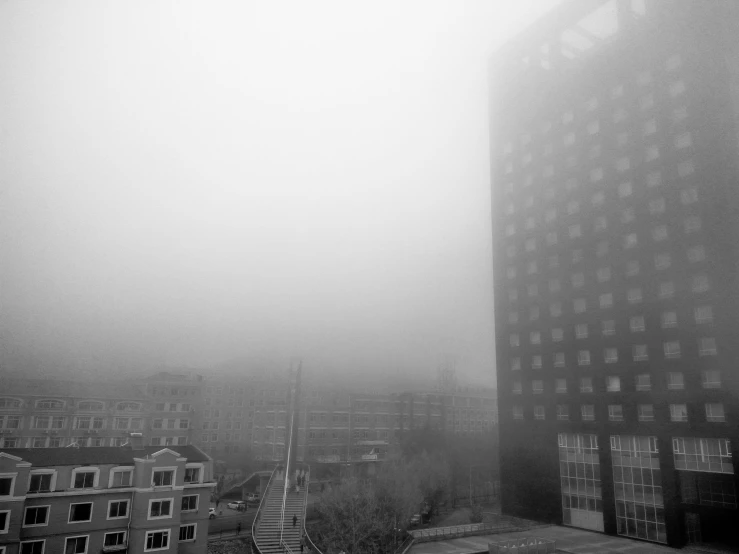 a view of buildings on a hazy day