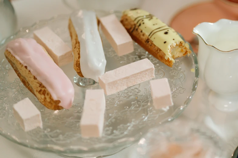 there is a bowl of desserts on this table