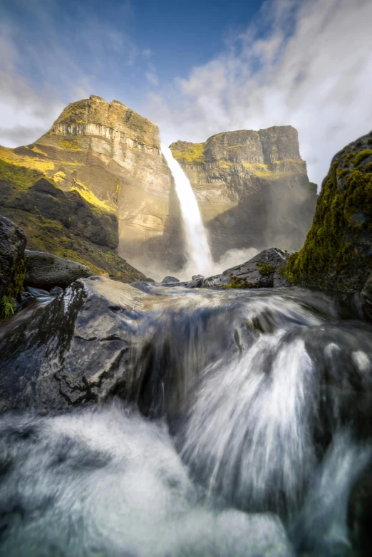 the view of the waterfall from below the water