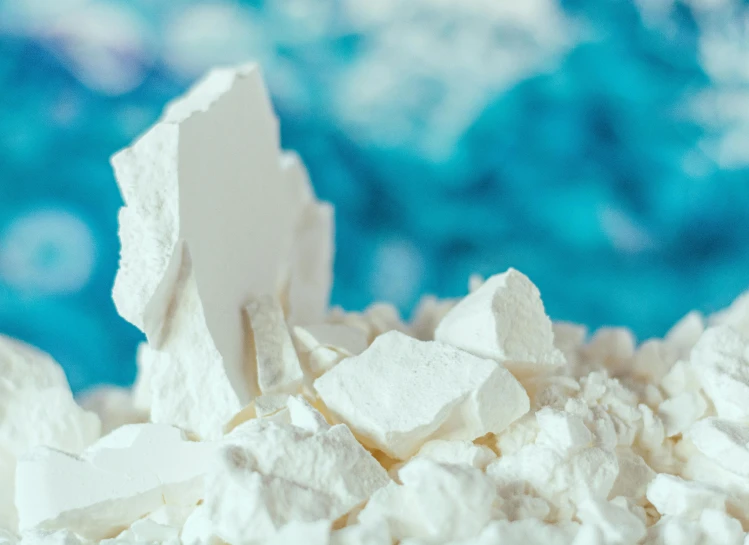 white sugar is scattered in a bowl