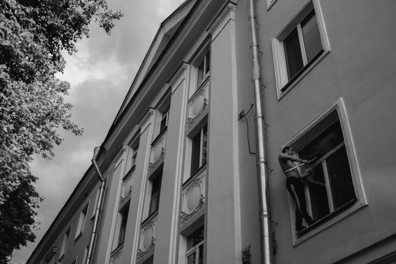 black and white po of the window of a tall building