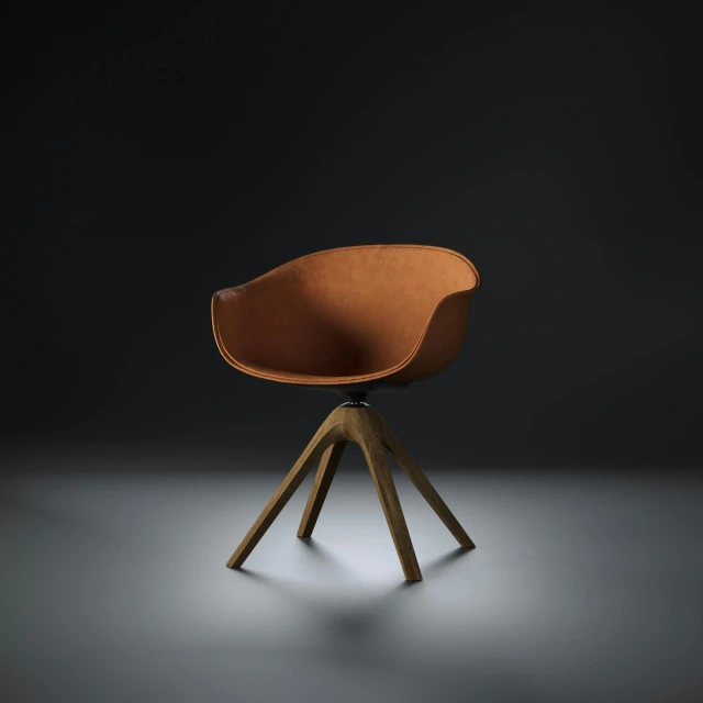 a modern chair made from an oak base and leather upholstered seat